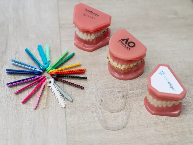 display of options invisalign vs tradtional braces examples